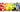 Collage of bright, colorful fruits in rainbow order.