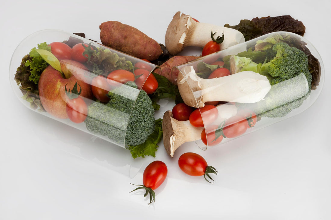 Clear supplement capsule broken open and filled with vegetables. 