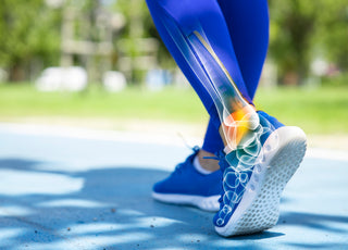 Close up of a woman's feet and lower legs while she is walking with a digital overlay showing the positioning of the bones and joints. 