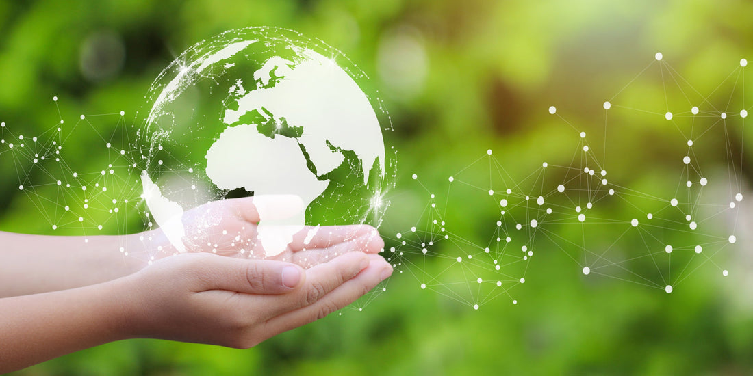 Woman holding white icon of Earth. 