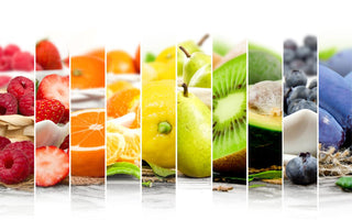 Collage of bright, colorful fruits in rainbow order. 